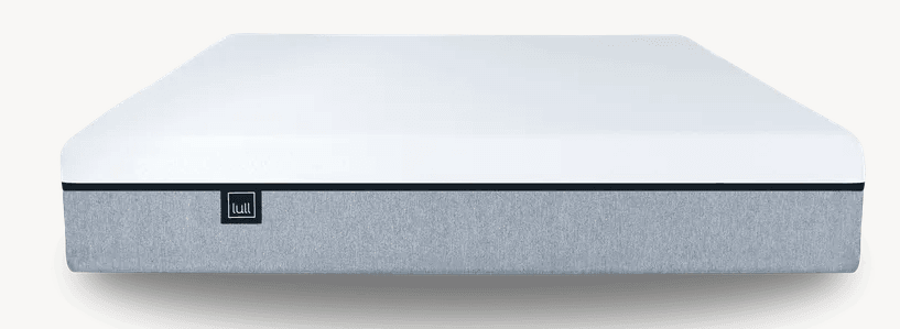 A grey and white Lull mattress with a black tag