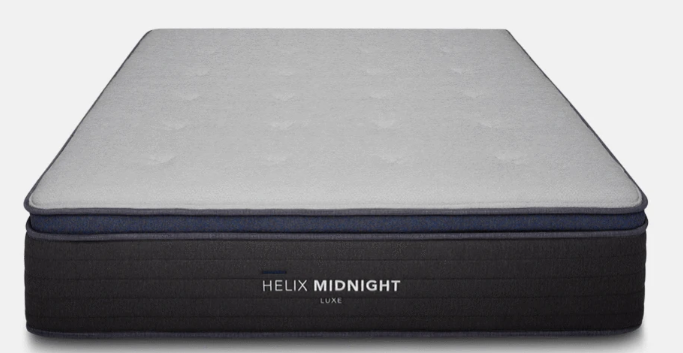 A close-up shot of a hybrid Helix Midnight Luxe mattress, isolated against white.